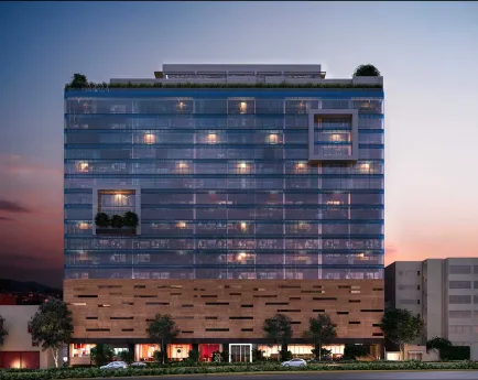 Entrada a la clínica con jardín